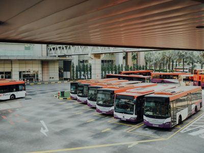 Bus depot with several parked buses.